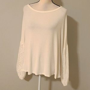 Story knit eyelit sleeve top